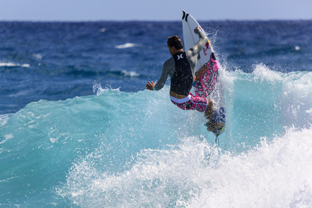 SNAPPER ROCKS, GOLD COAST, AUSTRALIA - 5 MARCH  Unidentified Surfer races the Quiksilver   Roxy Pro...