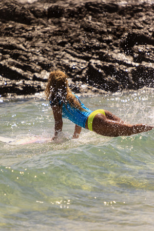 SNAPPER ROCKS, GOLD COAST, AUSTRALIA - 5 MARCH  Unidentified Surfer races the Quiksilver   Roxy Pro...