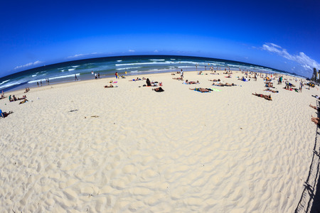 SURFERS PARADISE-OCT  19  Holiday-makers take an early morning stroll on the beach at Surfers...