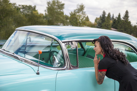 THORNCLIFF CALGARY CANADA, SEPT 13 2014: The annual Show and Shine with Pin Up Girls  "Cars before 1964"  was a great success. Not just great vehicles, models but also  live music brig the 60のeditorial素材