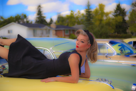  THORNCLIFF CALGARY CANADA, SEPT 13 2014: The annual Show and Shine with Pin Up Girls  \"Cars before 1964\"  was a great success. Not just great vehicles, models but also  live music brig the 60\' back..のeditorial素材