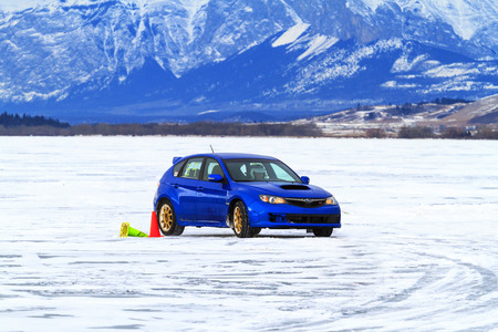 CALGARY CANADA - JANUARY 18, 2015: The Canadian CSCC Ice Racing on Ghost Lake annual race, where professional and enthusiast drivers were racing over the frozen lake with variety of vehicles.のeditorial素材