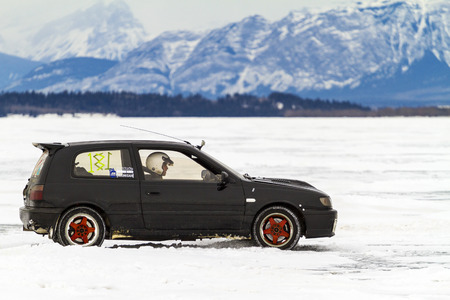CALGARY CANADA - JANUARY 18, 2015: The Canadian CSCC Ice Racing on Ghost Lake annual race, where professional and enthusiast drivers were racing over the frozen lake with variety of vehicles.のeditorial素材