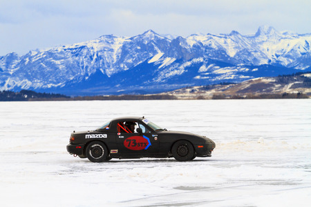 CALGARY CANADA - JANUARY 18, 2015: The Canadian CSCC Ice Racing on Ghost Lake annual race, where professional and enthusiast drivers were racing over the frozen lake with variety of vehicles.のeditorial素材