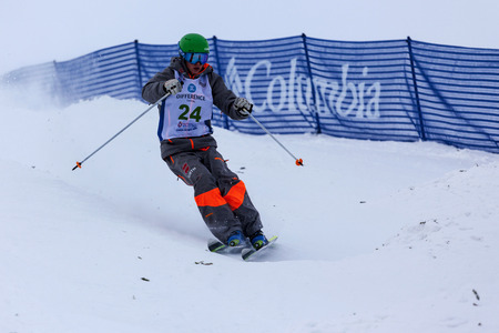 CALGARY CANADA JAN 2 2015. FIS Freestyle Ski World Cup, Winsport, Calgary Unidentified contender practicing on the slope at the Mogul Free Style World Cup on race  day.のeditorial素材