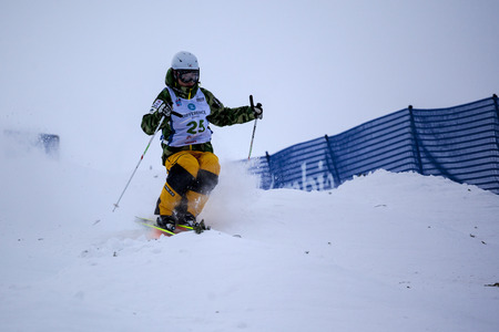 CALGARY CANADA JAN 2 2015. FIS Freestyle Ski World Cup, Winsport, Calgary Unidentified contender practicing on the slope at the Mogul Free Style World Cup on race day.のeditorial素材