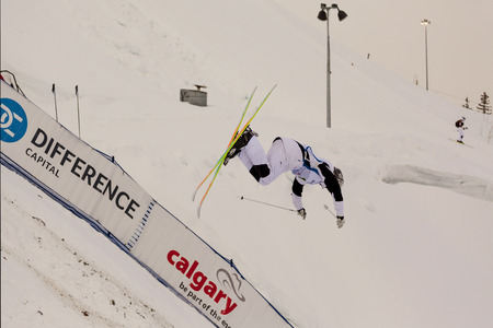CALGARY CANADA JAN 2 2015. FIS Freestyle Ski World Cup, Winsport, Calgary Unidentified contender practicing on the slope at the Mogul Free Style World Cup on race day.のeditorial素材