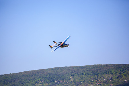 BUDAPEST, HUNGARY - APRIL 30: Aerobatics planes fly-by at Budaors airport These planes are designed...