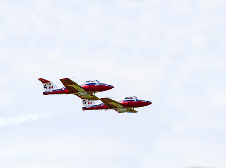 SPRINGBANK  CANADA - JUN 20, 2015: The Snowbirds Demonstration Team demonstrate the skill, professionalism, and teamwork of Canadian Forces personnel during the Wings Over Springbank.のeditorial素材