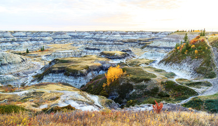 Badlands landscape, formed by deposition and erosion by wind and water, contains some of the richest fossil beds in the world,の写真素材