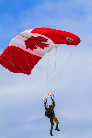 SPRINGBANK CANADA-JUN 20 2015 :Canadian military culture festival, SkyHawks, the Canadian Forces Parachute Team  in Alberta, Canada. The Great Military Team from 1812-2015 exhibitionのeditorial素材