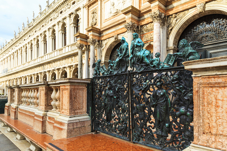 Decorative metal gate ornament. Antique iron door with classic ornaments of Campanile in Doge's palace, Venice, Italyのeditorial素材