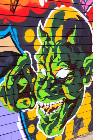 VICTORIA - B.C. CANADA- APR 9 2015 : Street art by unidentified artist in Victoria The art form graffiti is allowed and management to recognized. The street art in a vibrant urban culture.のeditorial素材