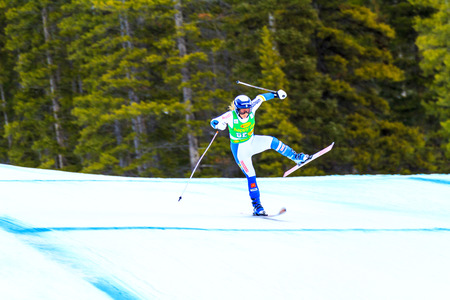 LAKE LOUISE, ALBERTA CANADA - DEC.7.2015. : 56 official entry speeds down the course during the Audi FIS Alpine Ski World Cup Ladies Super G race. The average speed is 110 km/h during the race.のeditorial素材