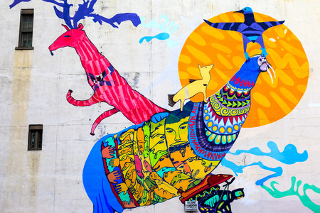 TORONTO,CANADA-16-10-2015:Kensington Market district covered in Graffiti the place is distinctive multicultural neighborhood of the Downtown what also house many small restaurants and art shops.のeditorial素材