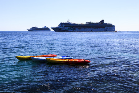 ROATAN ILAND HONDURAS JAN 28 2016:Ctruise ships docked near the bay at Coxen Hole, Roatan Town, with a population of 5,070, Favorite spot for cruise ships and tropical lover vacationersのeditorial素材