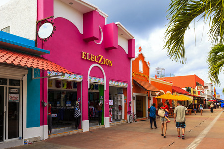 COZUMEL MEXICO JAN 26 2016:Colorful souvenir, coffee shops located in town. Tourists can buy various souvenirs as a memory about beautiful Tropical Island. The economy of Cozumel is based on tourism.のeditorial素材