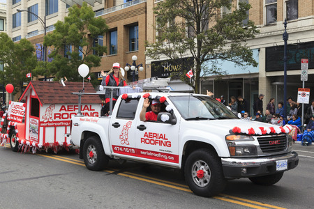 VICTORIA,BC,CANADA-MAY 23,2016: People, Organizations from Canada and USA in the Victoria Day parade along Douglas Street. This is Victoria's largest parade, attracting well over 100,000 people..のeditorial素材