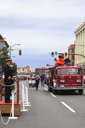 VICTORIA,BC,CANADA-MAY 23,2016: People, Organizations from Canada and USA in the Victoria Day parade...