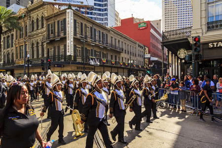 NEW ORLEANS USA FEB 1 2016: Mardi Gras parades through the streets of New Orleans. People celebrated crazily. Mardi Gras is the biggest celebration the city of New Orleans hosts every year.のeditorial素材