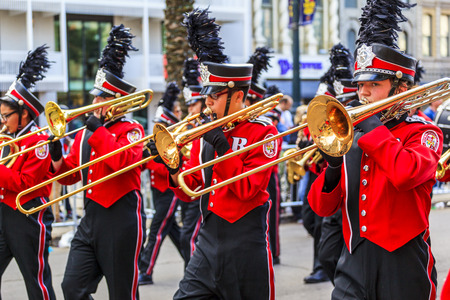 NEW ORLEANS USA FEB 1 2016: Mardi Gras parades through the streets of New Orleans. People celebrated crazily. Mardi Gras is the biggest celebration the city of New Orleans hosts every year.のeditorial素材
