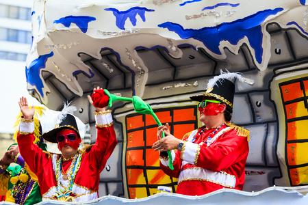 NEW ORLEANS USA FEB 1 2016: Mardi Gras parades through the streets of New Orleans. People celebrated crazily. Mardi Gras is the biggest celebration the city of New Orleans hosts every year.のeditorial素材