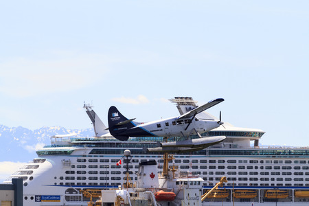 VICTORIA, BC, CANADA - JUN 30 2016: Float-plane traffic in the inner harbor. This transportation is...