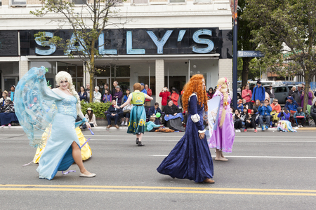 VICTORIA,BC,CANADA-MAY 23,2016: People and Organizations from Canada and USA in the Victoria Day parade along Douglas Street. This is Victoria's largest parade, attracting well over 100,000 people..のeditorial素材