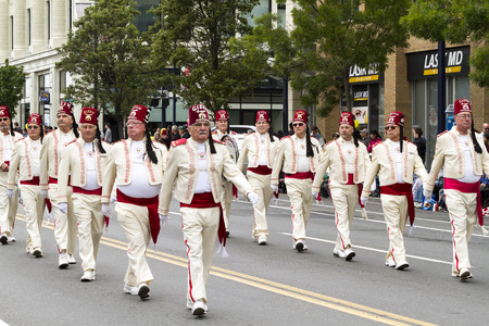 VICTORIA,BC,CANADA-MAY 23,2016: Marching Bands from Canada and USA in the Victoria Day parade along...