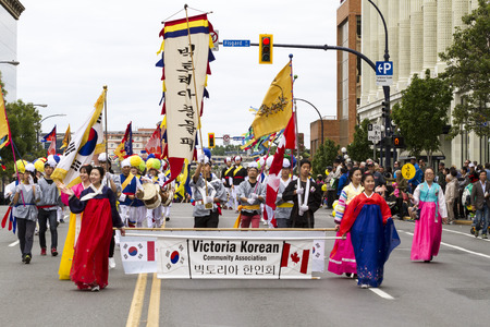 VICTORIA,BC,CANADA-MAY 23,2016: People, Organizations from Canada and USA in the Victoria Day parade along Douglas Street. This is Victoria's largest parade, attracting well over 100,000 people..のeditorial素材