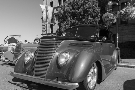 VICTORIA, BRITISH COLUMBIA - JULY 24, 2016: The largest collection of Deuces anywhere staged all around the beautiful Victoria Inner Harbor. Northwest Deuce Day is a sight to see!のeditorial素材