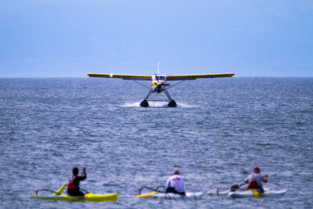 VICTORIA, BC, CANADA - MAY 4 2016: Float-plane traffic in the inner harbor. This transportation is vital and very frequent between Vitoria and Vancouver, also the flight is very pictures.のeditorial素材