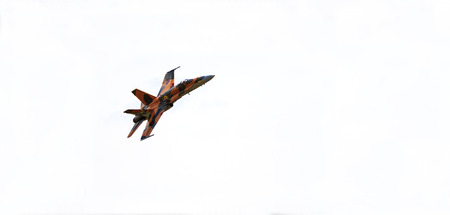 LETHBRIDGE CANADA - JUN 25, 2015: Royal Canadian Air Force CF-18 Hornet tactical fighter aircraft displaying flight agility at the Wing Over Lethbridge Airshowのeditorial素材