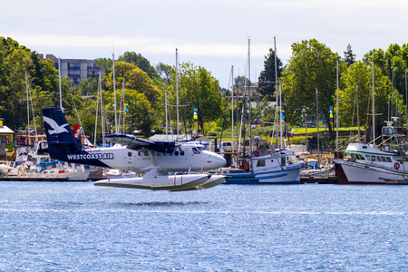 VICTORIA, BC, CANADA - JUN 24 2016: Royals Victoria Float-plane in the inner harbor. This transportation is vital and very frequent between Vitoria and Vancouver, also the flight is very pictures.のeditorial素材