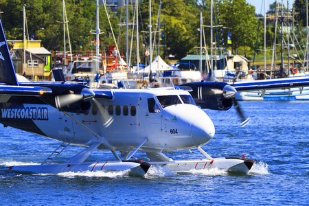 VICTORIA, BC, CANADA - JUN 24 2016: Royals Victoria Float-plane in the inner harbor. This transportation is vital and very frequent between Vitoria and Vancouver, also the flight is very pictures.のeditorial素材