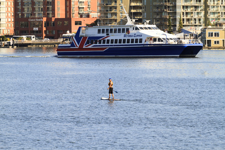 VICTORIA, BC, CANADA - MAY 7 2016: Travel between Seattle and Victoria, BC is fast and convenient aboard a high-speed Victoria Clipper passenger ferry. Victoria is one of the tourist destinationのeditorial素材