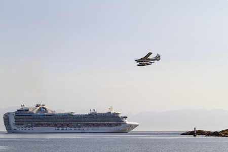 VICTORIA, BC, CANADA - JULY 21 2016. Cruise ship in Victoria. Each year hundreds of cruise ships docks in for a day or two. Victoria's charm and beauty has a lot to offer for any world traveler.のeditorial素材