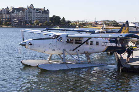VICTORIA, BC, CANADA - JULY 24 2016: Float-plane traffic in the inner harbor. This transportation is...