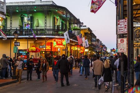 NEW ORLEANS, LOUISIANA USA- JAN 23 2016: Pubs and Bars having colorful lights and decorations in the French Quarter. Tourism provides a much needed financial source, also home for great musicians.のeditorial素材