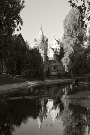 BUDAPEST HUNGARY SEPT 26 2016: Vajdahunyad Castle. People are passing by building of agricultural museum inside complex of Vajdahunyad Castle. Visitors enjoy the historical schinery all year aroundのeditorial素材