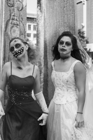 VICTORIA CANADA OCT 7 2016: Zombies take over the Victoria down town during the 2016 Zombie Walk II. Young people in costumes of zombie participating. Zombie Walk is an annual event in Victoria.のeditorial素材