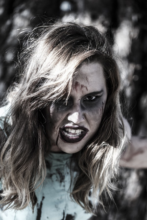 VICTORIA CANADA OCT 29 2016: Zombies take over the Victoria down town during the 2016 Zombie Walk II. Young people in costumes of zombie participating. Zombie Walk is an annual event in Victoria.のeditorial素材