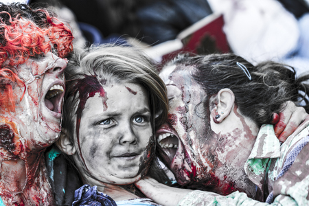 VICTORIA CANADA OCT 29 2016: Zombies take over the Victoria down town during the 2016 Zombie Walk II. Young people in costumes of zombie participating. Zombie Walk is an annual event in Victoria.のeditorial素材