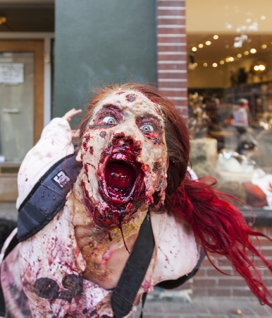 VICTORIA CANADA OCT 7 2017: People in costumes are on the Zombies walk in Victoria down town during the annual Zombie Walk .のeditorial素材