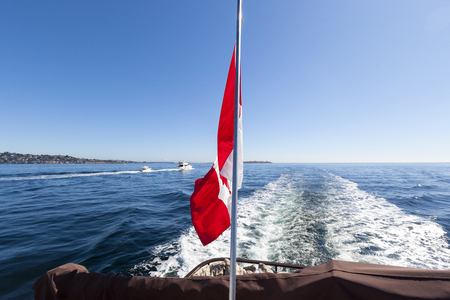 VICTORIA BC CANADA SEPT 3 2017: Vintage boat sails on the Victoria Classic Boat Festival. This vintaのeditorial素材