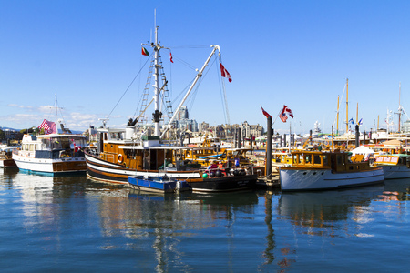 VICTORIA B.C. CANADA SEPT 2 2017: Vintage boats are docked at the Victoria Classic Boat Festival. These vintage boats are the showcase of the 3 days annual event.のeditorial素材