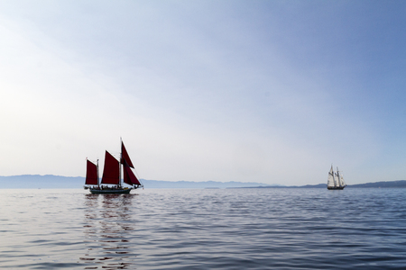 VICTORIA BC CANADA SEPT 3 2017: Vintage boat sails on the Victoria Classic Boat Festival. This...