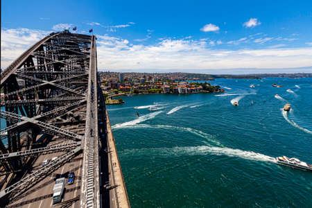 Sydney Australia - Feb 2, 2019: The Sydney Harbor Bridge while visitors climbing on. Opened to the public in 1932. It's the fifth longest spanning arch-bridge in the world.のeditorial素材