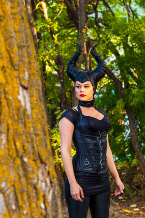 Calgary Canada - Sept 01, 2014: Illustrative cosplayer dressed up as witch with horns. Demonic, dark...