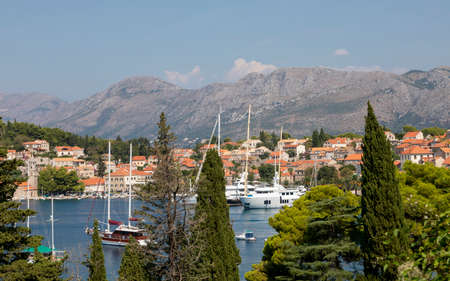 Dubrovnik Croatian Sept. 14 2019: Beautiful sunny day over the bay in front of old town of Dubrovnik as tourists are strolling the ancient city.の写真素材